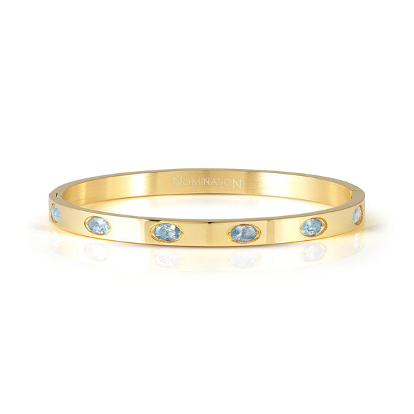 Pretty Bangles: Gold PVD Thick 6 Oval Light Blue CZ