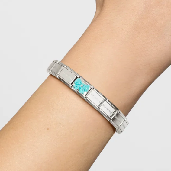 Symbols - Turquoise Synthetic Stone Bow Silver Charm
